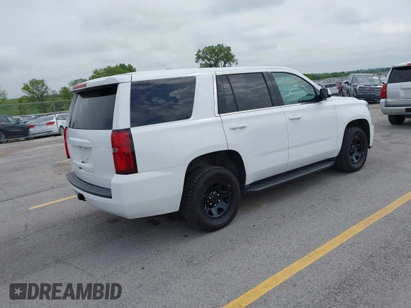 2020 Chevrolet Tahoe Commercial with VIN 1GNSKDEC2LR260646, listed as a IAAI auction lot 42800810 with 114,704 mi miles and . Bid and sale history available at DreamBid. Image 4.