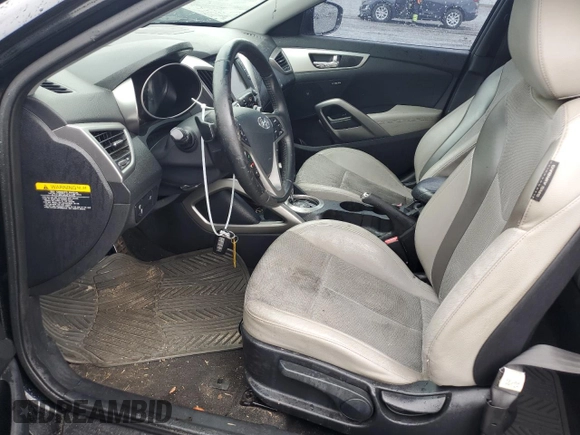 2013 Hyundai Veloster w/Gray Int с VIN KMHTC6AD8DU113990, выставлен на аукционе Copart как лот 54571895 с пробегом 181 757 миль миль и Списание • Salvage title. История ставок и продаж доступна на DreamBid. Изображение 7.