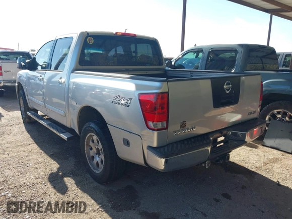 2004 Nissan Titan LE z VIN 1N6AA07BX4N537229, wystawiony jako IAAI lot #41234790 z przebiegiem 210 475 mil mil oraz . Historia ofert i sprzedaży dostępna na DreamBid. Obrazek 3.