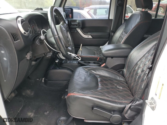 2014 Jeep Wrangler Unlimited Sahara with VIN 1C4HJWEG1EL320667, listed as a Copart auction lot 53719395 with 144,802 mi miles and Clean Title. Bid and sale history available at carsss.com. Image 7.