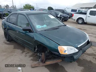 2001 Honda Civic LX with VIN JHMES16571S002955, listed as a IAAI auction lot 42128296 with 223,009 mi miles and . Bid and sale history available at carsss.com. Image 1.