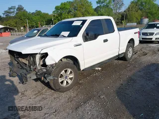 2016 Ford F-150 XLT with VIN 1FTFX1EF4GKE50550, listed as a IAAI auction lot 41974498 with 154,409 mi miles. Bid and sale history available at carsss.com. Image 2.