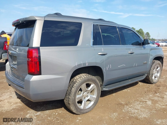 2017 Chevrolet Tahoe LT with VIN 1GNSCBKC2HR260627, listed as a IAAI auction lot 41580613 with 156,650 mi miles. Bid and sale history available at carsss.com. Image 4.