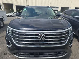 2024 Volkswagen Atlas SE with VIN 1V2HR2CA1RC579096, listed as a IAAI auction lot 42751185 with 15,477 mi miles and . Bid and sale history available at DreamBid. Image 4.