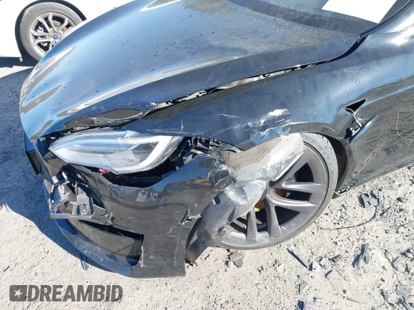 2021 Tesla Model S Long Range z VIN 5YJSA1E50MF438864, wystawiony jako IAAI lot #41190778 z przebiegiem Nie podano mil oraz . Historia ofert i sprzedaży dostępna na DreamBid. Obrazek 6.