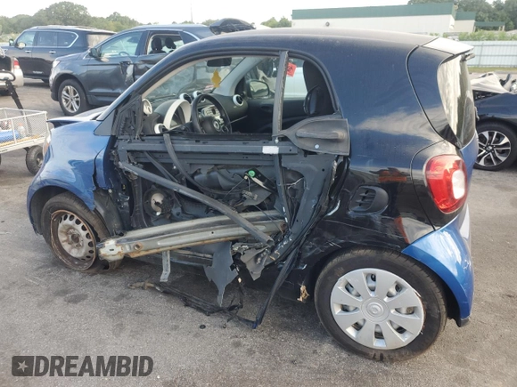 2016 Smart fortwo Passion z VIN WMEFJ5DA0GK076339, wystawiony jako Copart lot #68891564 z przebiegiem Nie podano mil oraz Szkoda całkowita • Salvage title. Historia ofert i sprzedaży dostępna na DreamBid. Obrazek 2.