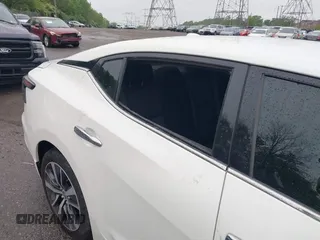 2020 Nissan Maxima S with VIN 1N4AA6BV4LC364136, listed as a IAAI auction lot 42195018 with 38,941 mi miles and . Bid and sale history available at DreamBid. Image 6.