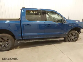 2022 Ford F-150 Lightning Pro with VIN 1FTVW1EL7NWG15923, listed as a IAAI auction lot 41396120 with 25,322 mi miles. Bid and sale history available at carsss.com. Image 13.