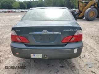 2003 Toyota Avalon XL z VIN 4T1BF28B43U322481, wystawiony jako Copart lot #51876905 z przebiegiem 135 237 mil mil oraz Szkoda całkowita • Salvage title. Historia ofert i sprzedaży dostępna na DreamBid. Obrazek 6.