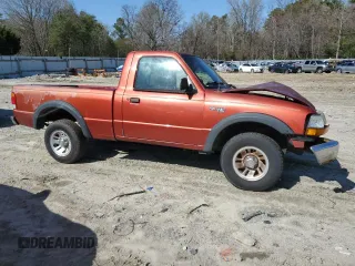 1999 Ford Ranger XL with VIN 1FTYR10C5XUB06570, listed as a Copart auction lot 51580125 with 246,020 mi miles and Salvage Title. Bid and sale history available at carsss.com. Image 4.