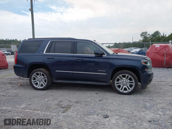 2019 Chevrolet Tahoe LT with VIN 1GNSCBKC7KR133119, listed as a IAAI auction lot 41570650 with 114,575 mi miles and . Bid and sale history available at DreamBid. Image 13.