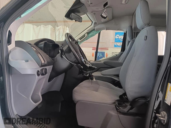2018 Ford Transit Passenger XL z VIN 1FBZX2YG9JKA79775, wystawiony jako Copart lot #60044743 z przebiegiem 57 404 mil mil oraz Szkoda całkowita • Salvage title. Historia ofert i sprzedaży dostępna na DreamBid. Obrazek 7.