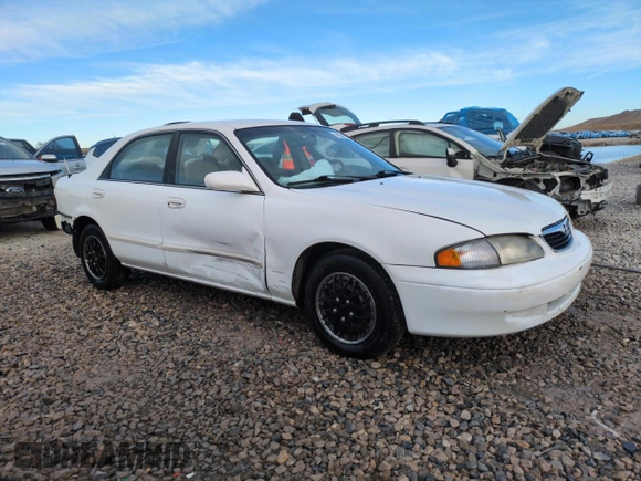 1999 Mazda 626 ES z VIN 1YVGF22C9X5887587, wystawiony jako Copart lot #46346305 z przebiegiem 92 715 mil mil oraz Szkoda całkowita • Salvage title. Historia ofert i sprzedaży dostępna na DreamBid. Obrazek 4.