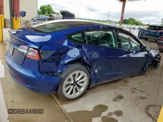 2022 Tesla Model 3 z VIN 5YJ3E1EA7NF289098, wystawiony jako Copart lot #60637005 z przebiegiem 152 060 mil mil oraz Czysty tytuł • Clean title. Historia ofert i sprzedaży dostępna na DreamBid. Obrazek 3.