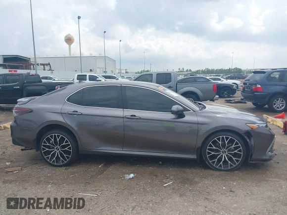2023 Toyota Camry LE z VIN 4T1C11AK8PU132325, wystawiony jako IAAI lot #42093856 z przebiegiem 29 115 mil mil oraz . Historia ofert i sprzedaży dostępna na DreamBid. Obrazek 14.