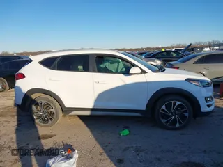 2019 Hyundai Tucson Sport with VIN KM8J33AL1KU838499, listed as a IAAI auction lot 41317832 with 71,594 mi miles. Bid and sale history available at carsss.com. Image 13.