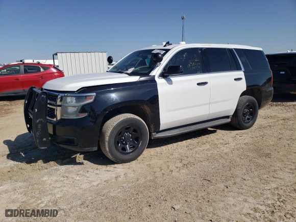 2016 Chevrolet Tahoe Commercial with VIN 1GNLCDEC2GR136559, listed as a Copart auction lot 51077695 with 123,968 mi miles and Salvage Title. Bid and sale history available at carsss.com. Image 1.