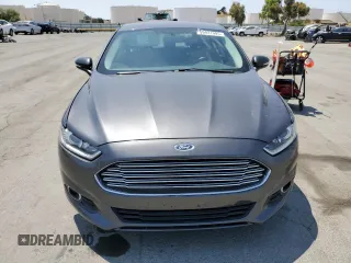 2016 Ford Fusion SE Hybrid with VIN 3FA6P0LU9GR166408, listed as a Copart auction lot 59931995 with 104,560 mi miles and Salvage title. Bid and sale history available at DreamBid. Image 5.