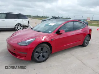 2023 Tesla Model 3 with VIN 5YJ3E1EA0PF455058, listed as a IAAI auction lot 42201618 with 31,147 mi miles and . Bid and sale history available at DreamBid. Image 2.