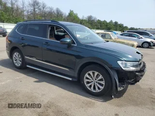 2018 Volkswagen Tiguan SEL with VIN 3VV2B7AX8JM154396, listed as a Copart auction lot 60984075 with 67,237 mi miles and Salvage title. Bid and sale history available at DreamBid. Image 4.