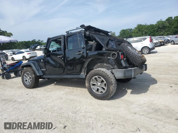 2016 Jeep Wrangler Unlimited Rubicon with VIN 1C4BJWFG7GL320650, listed as a Copart auction lot 53900195 with 77,620 mi miles and Salvage title. Bid and sale history available at DreamBid. Image 2.
