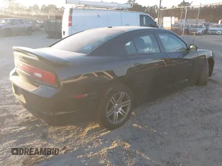 2013 Dodge Charger RT with VIN 2C3CDXCT4DH696609, listed as a IAAI auction lot 40979934 with 118,148 mi miles. Bid and sale history available at carsss.com. Image 4.