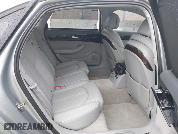 2012 Audi A8 z VIN WAURVAFD5CN008320, wystawiony jako IAAI lot #41508237 z przebiegiem 183 398 mil mil oraz . Historia ofert i sprzedaży dostępna na DreamBid. Obrazek 8.