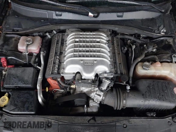 2019 Dodge Charger SRT Hellcat with VIN 2C3CDXL97KH552439, listed as a IAAI auction lot 41813879 with 58,921 mi miles and . Bid and sale history available at DreamBid. Image 10.