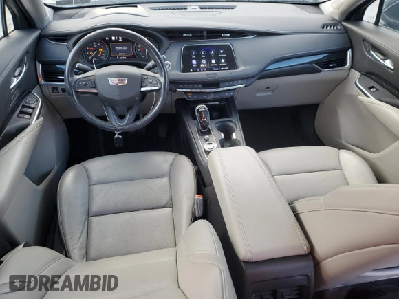 2021 Cadillac XT4 AWD Premium Luxury with VIN 1GYFZDR4XMF007080, listed as a Copart auction lot 87943335 with 36,379 mi miles and Salvage Title. Bid and sale history available at carsss.com. Image 8.