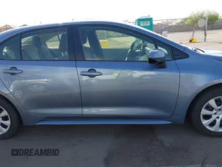 2023 Toyota Corolla LE with VIN JTDB4MEE1P3003586, listed as a IAAI auction lot 41944898 with 49,236 mi miles and . Bid and sale history available at DreamBid. Image 14.
