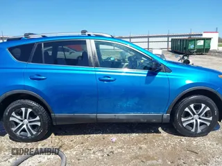 2017 Toyota RAV4 LE with VIN 2T3ZFREV2HW404424, listed as a IAAI auction lot 41862300 with 164,267 mi miles and . Bid and sale history available at carsss.com. Image 14.