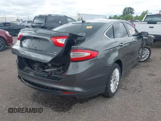 2016 Ford Fusion SE Hybrid with VIN 3FA6P0LU1GR191528, listed as a IAAI auction lot 42283058 with Not provided miles and . Bid and sale history available at DreamBid. Image 4.