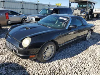 2003 Ford Thunderbird Deluxe with VIN 1FAHP60A63Y110587, listed as a Copart auction lot 78423314 with 119,172 mi miles and Salvage Title. Bid and sale history available at DreamBid. Image 1.