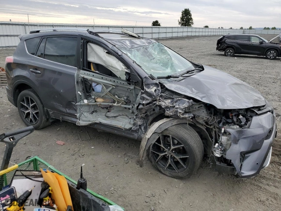 2016 Toyota RAV4 SE with VIN JTMJFREV9GJ088756, listed as a Copart auction lot 69210994 with 0 mi miles and Salvage Title. Bid and sale history available at carsss.com. Image 4.