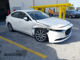 2021 Mazda 3 Select with VIN JM1BPABL0M1325104, listed as a IAAI auction lot 40398465 with Not provided miles and . Bid and sale history available at DreamBid. Image 1.