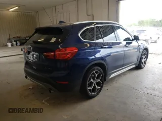 2018 BMW X1 xDrive28i with VIN WBXHT3C30J3H33429, listed as a Copart auction lot 49220033 with 28,916 mi miles. Bid and sale history available at carsss.com. Image 3.