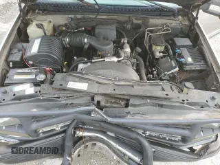 1999 Chevrolet Silverado 3500 z VIN 1GCHK33R4XF096473, wystawiony jako Copart lot #65189104 z przebiegiem 174 416 mil mil oraz Szkody całkowita. Historia ofert i sprzedaży dostępna na DreamBid. Obrazek 11.