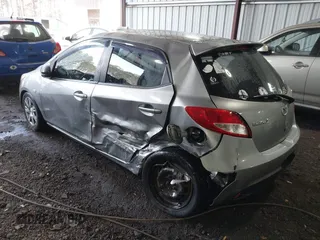 2013 Mazda 2 Sport with VIN JM1DE1KY1D0167999, listed as a IAAI auction lot 41713546 with 204,443 mi miles and . Bid and sale history available at DreamBid. Image 6.