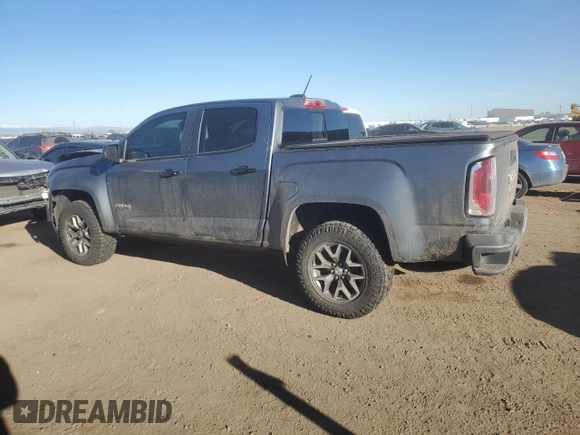 2022 GMC Canyon 4WD AT4 w/Leather with VIN 1GTG6FEN2N1287329, listed as a Copart auction lot 46471595 with 38,694 mi miles and Salvage Title. Bid and sale history available at carsss.com. Image 2.
