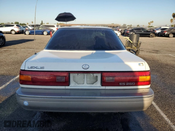 1990 Lexus ES z VIN JT8VV22T5L0096463, wystawiony jako Copart lot #70032254 z przebiegiem 127 414 mil mil oraz Szkoda całkowita • Salvage title. Historia ofert i sprzedaży dostępna na DreamBid. Obrazek 6.