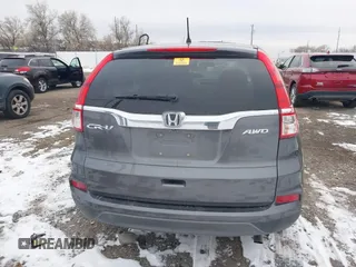 2015 Honda CR-V LX with VIN 2HKRM4H3XFH619055, listed as a IAAI auction lot 40989227 with 113,332 mi miles and . Bid and sale history available at DreamBid. Image 16.