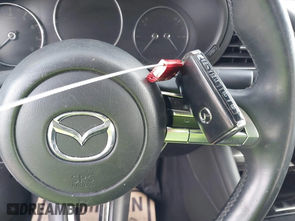 2019 Mazda 3 w/Select with VIN 3MZBPAALXKM110263, listed as a IAAI auction lot 40956795 with 35,000 mi miles. Bid and sale history available at carsss.com. Image 11.