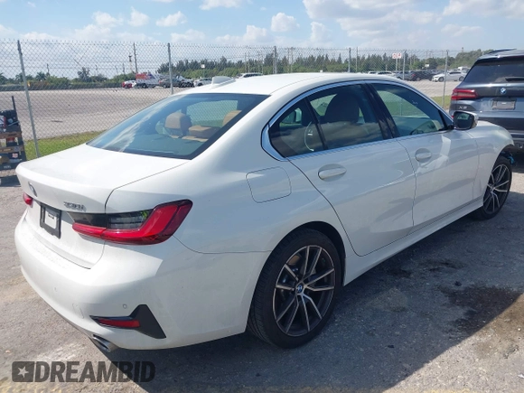 2022 BMW 3 Series 330i with VIN 3MW5R1J04N8C75820, listed as a IAAI auction lot 41702506 with 17,421 mi miles. Bid and sale history available at carsss.com. Image 4.