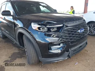 2022 Ford Explorer ST-Line z VIN 1FMSK7KH5NGA21032, wystawiony jako IAAI lot #42212415 z przebiegiem 49 034 mil mil oraz . Historia ofert i sprzedaży dostępna na DreamBid. Obrazek 6.