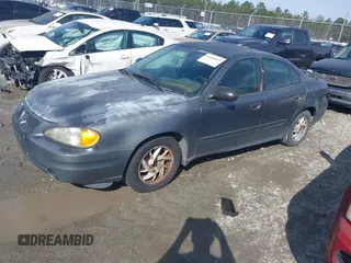 2004 Pontiac Grand Am SE1 z VIN 1G2NF52F04M513755, wystawiony jako IAAI lot #41600613 z przebiegiem Nie podano mil oraz . Historia ofert i sprzedaży dostępna na DreamBid. Obrazek 2.