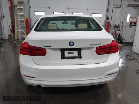 2018 BMW 3 Series 320i xDrive with VIN WBA8E5G56JNU47338, listed as a IAAI auction lot 41238204 with 54,596 mi miles. Bid and sale history available at carsss.com. Image 16.