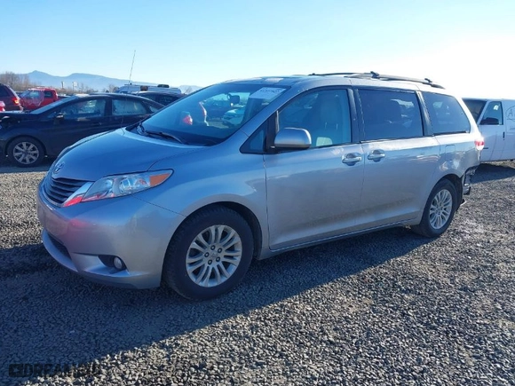 2012 Toyota Sienna XLE AAS with VIN 5TDYK3DC3CS240213, listed as a IAAI auction lot 41522822 with 147,903 mi miles. Bid and sale history available at carsss.com. Image 2.