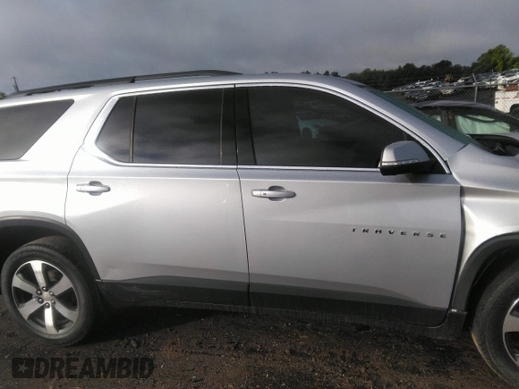 2021 Chevrolet Traverse LT with VIN 1GNERHKW6MJ157311, listed as a IAAI auction lot 42256458 with 97,635 mi miles and . Bid and sale history available at DreamBid. Image 13.
