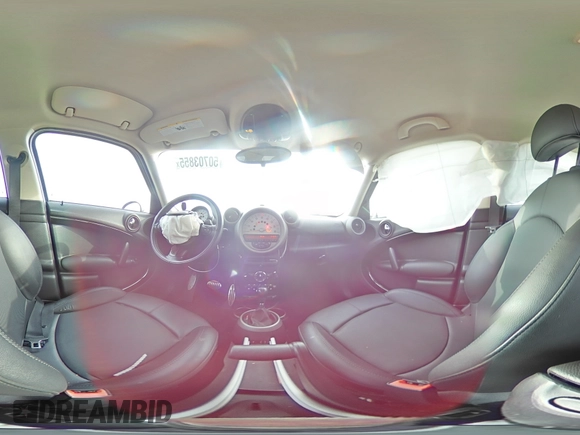 2012 MINI Countryman S with VIN WMWZC5C55CWL64092, listed as a Copart auction lot 50703855 with 69,785 mi miles and Salvage Title. Bid and sale history available at DreamBid. Image 13.
