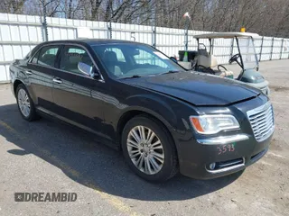 2013 Chrysler 300 with VIN 2C3CCAKT1DH652875, listed as a IAAI auction lot 42043593 with 217,560 mi miles. Bid and sale history available at carsss.com. Image 1.